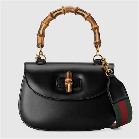 borsa gucci manici di bambu|Borsa a mano Gucci Bamboo 1947 in pelle nera .